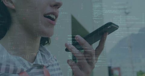 Person using voice command with code overlay