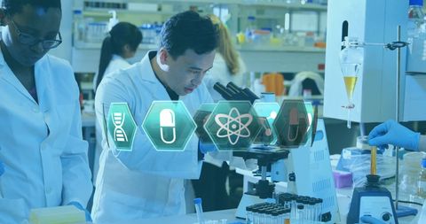 Diverse Scientists Using Microscope in Innovative Laboratory - Download Free Stock Images Pikwizard.com