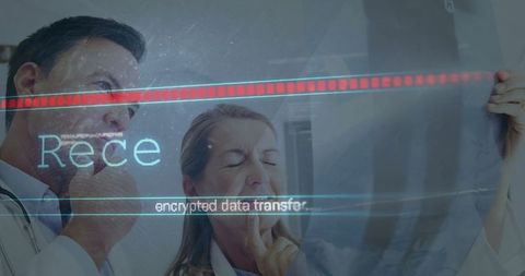 Senior doctors analyzing x-ray with data overlay for diagnostic technology