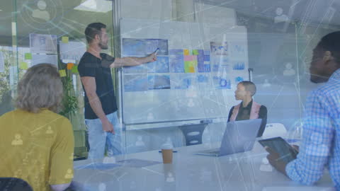 Diverse Team Collaborating with Innovative Technology in Office