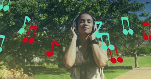 Joyful Woman Enjoying Music Outdoors with Scooter