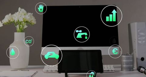 Minimalist eco workspace showing digital sustainability icons on desktop and tablet