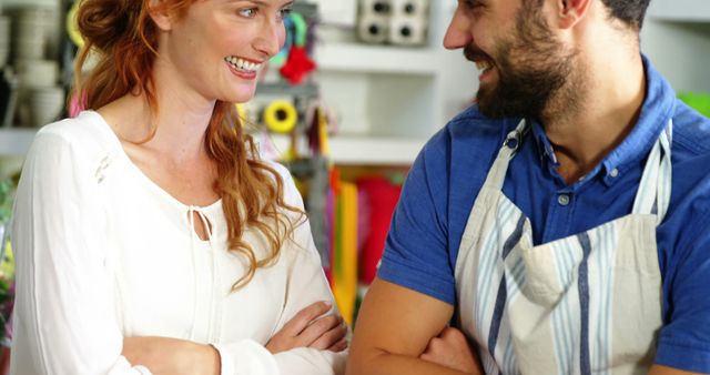 Two Young Entrepreneurs Smiling and Talking in a Craft Store - Download Free Stock Images Pikwizard.com