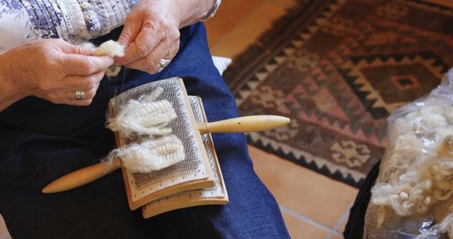 Hands Carding Wool Fibers on Tool in Traditional Craft Process - Download Free Stock Images Pikwizard.com