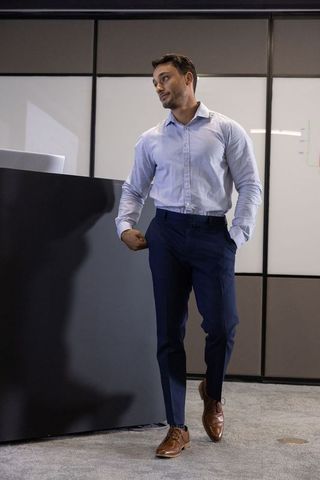 Business professional in conference room during presentation