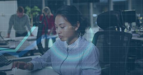 Financial Data Analysis by Businesswoman in Modern Office