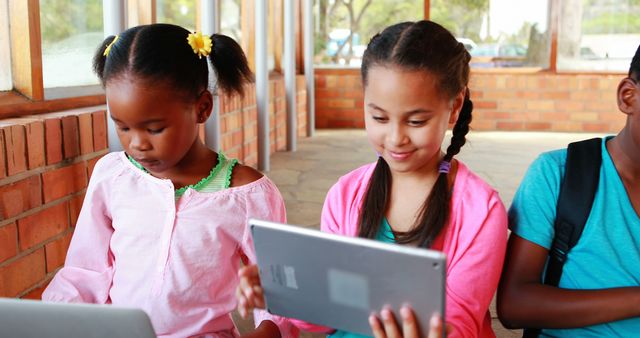 Diverse Kids Using Tablets in Outdoor Learning Space - Download Free Stock Images Pikwizard.com