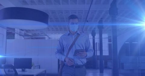 Office Worker in Mask Using Smartphone Amid COVID-19 Pandemic