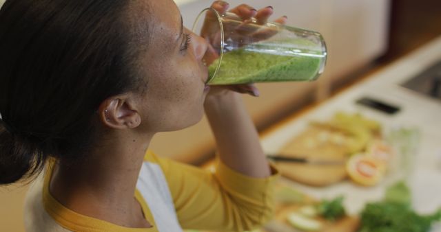 Woman Drinking Green Smoothie at Home - Download Free Stock Images Pikwizard.com