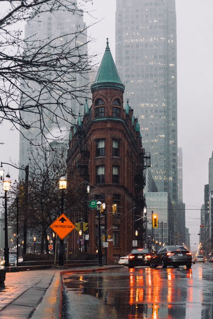 Dreary Afternoon on Busy City Street with Gothic Building and Skyscrapers - Download Free Stock Images Pikwizard.com