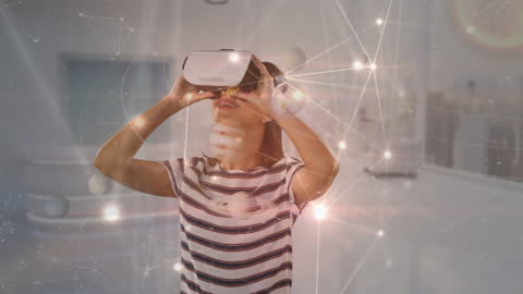 Woman Interacting with Virtual Interface Using VR Headset
