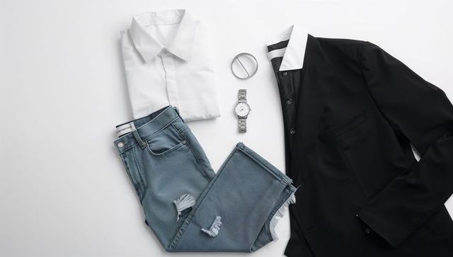 Mens smart casual flatlay with black blazer, white dress shirt, distressed jeans and watch