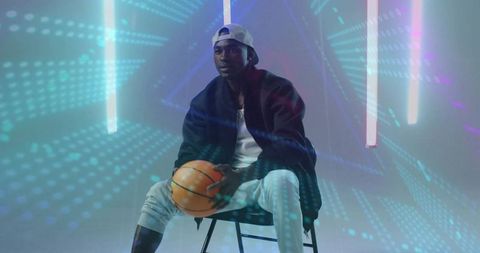 Athletic Innovation: Man with Basketball in Futuristic Setting