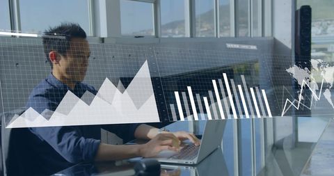 Financial Analyst Reviewing Charts on Laptop Close-Up