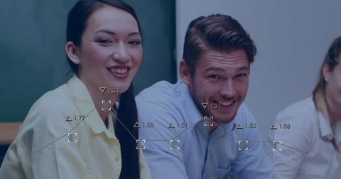 Schoolchildren studying with digital learning tools in classroom