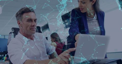 Modern Business Team Collaborating with Digital Overlay