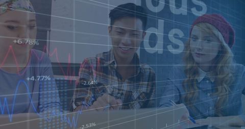 Diverse Team Analyzing Market Data on Laptops