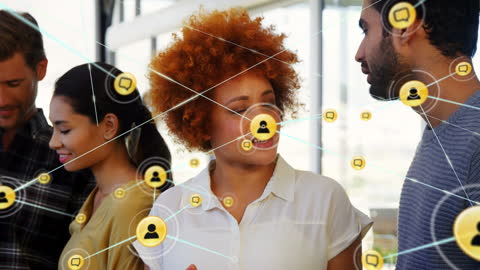 Diverse Business Team Interacting with Digital Networks in Office