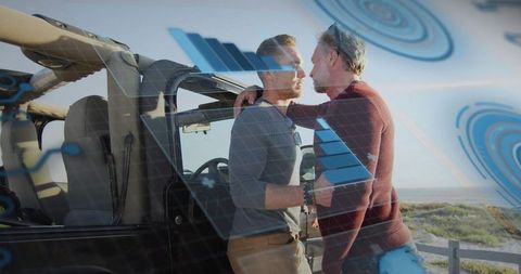 Intimate coastal moment between two men leaning on jeep with ar blue overlay