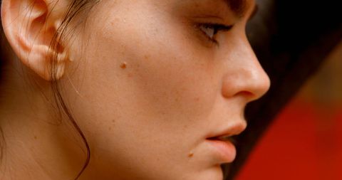 Tired Woman Resting Post Workout in Gym