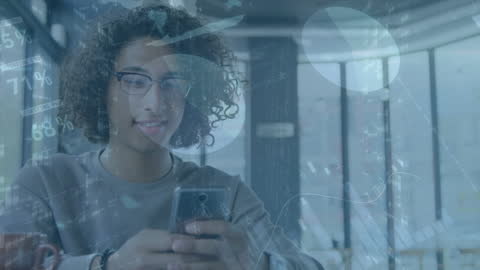 Young Business Professional Analyzing Financial Data via Smartphone