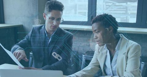 Diverse Colleagues Analyzing Digital Data Overlay