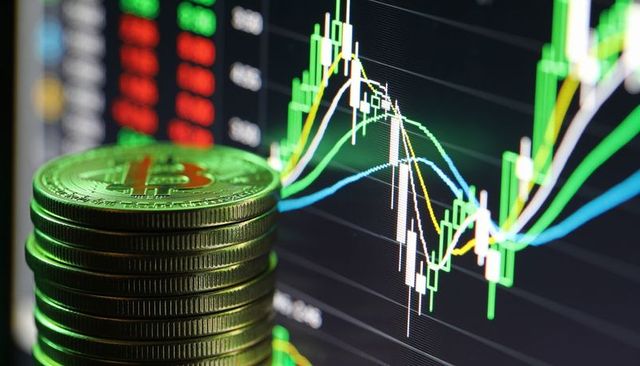 Stacked bitcoin coins glowing beside candlestick chart showing crypto market trends