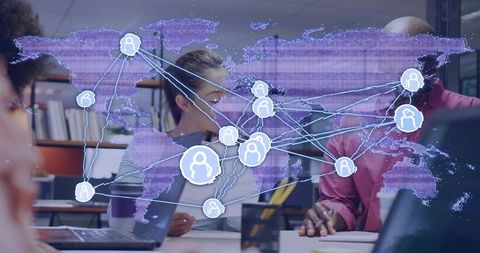 Global team collaborating over holographic world network map in modern office meeting