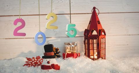Festive 2025 New Year Decoration with Snowman and Lantern - Download Free Stock Images Pikwizard.com