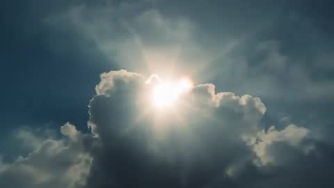 Sunburst Through Cloudy Sky with Dynamic Sun Rays