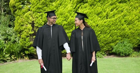 Graduating Students Celebrating Achievement Outdoors