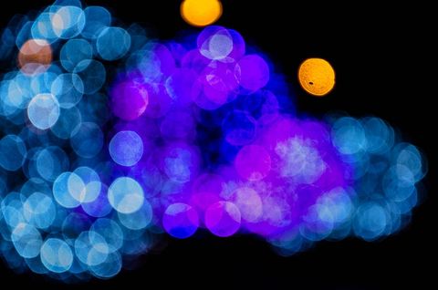Colorful Bokeh Lights, Blue and Purple Glowing in Dark