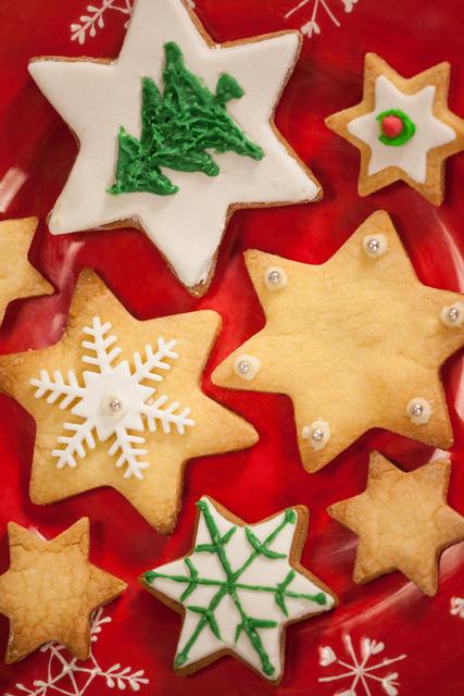Christmas Star Cookies on Red Plate - Download Free Stock Photos Pikwizard.com