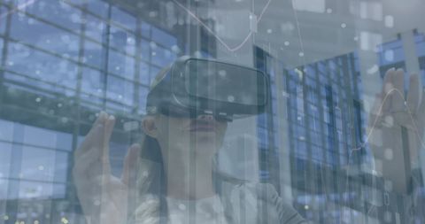 Businesswoman Engaging with Virtual Reality Financial Data Overlay - Download Free Stock Images Pikwizard.com