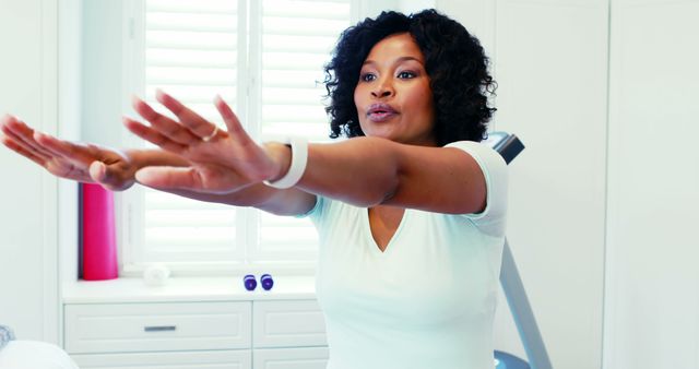 Woman Exercising at Home in Bright Room - Download Free Stock Images Pikwizard.com