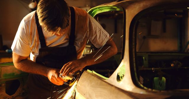 Skilled Mechanic Grinding Metal in Auto Repair Shop - Download Free Stock Images Pikwizard.com