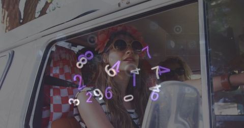 Happy Couple on Road Trip with Digital Numbers Overlay