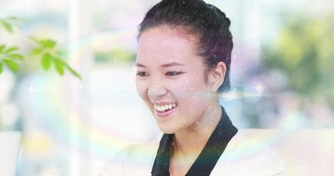 Smiling Professional Woman in Modern Office with Pastel Sparkles