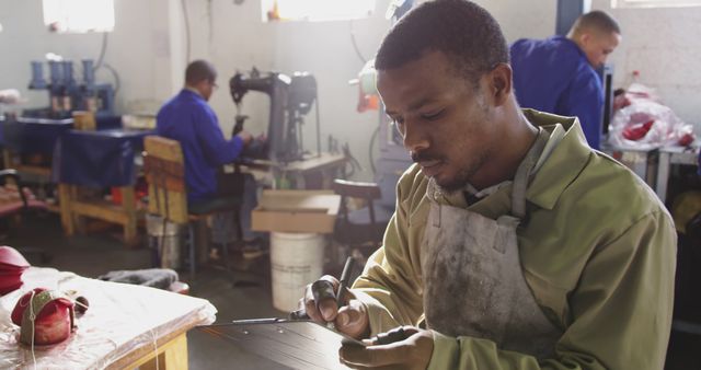 Young Shoe Repairman at Work in Artisan Workshop - Download Free Stock Images Pikwizard.com