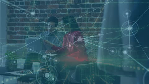 Diverse Business Team Analyzing Digital Networking Concepts