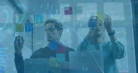 Creative Business Team Analyzing Financial Data in Office