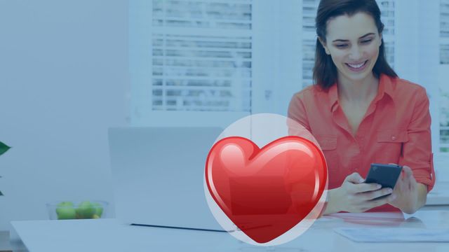 Young businesswoman in attractive office setting, interacting with smartphone while colorful heart icons float around. Highlights the blend of modern communication technology and emotion, suitable for themes of social media engagement, digital marketing, online communication, or work-life balance.