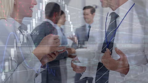 Business Team Discussing Finances With Technology Overlay