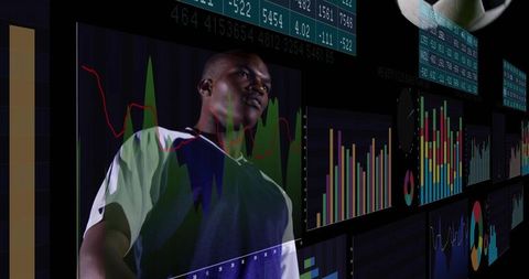 Analytical Insight: Man Examines Futuristic Finance Dashboards