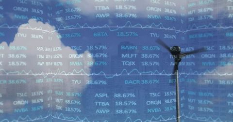 Stock Market Data with Spinning Wind Turbine Under Blue Sky