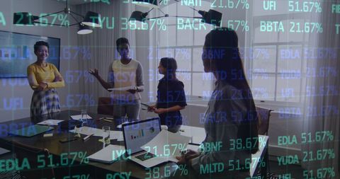 Diverse Team Collaborating in Data-Driven Office Environment