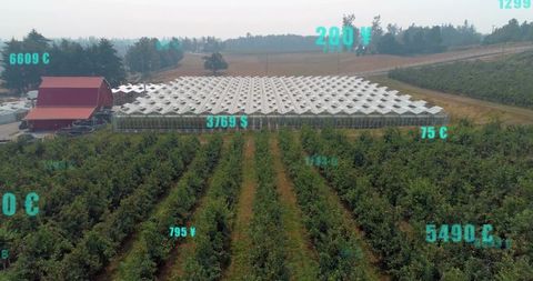 Drone overlooking smart greenhouse with white roof, red barn and live telemetry overlays
