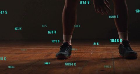 Standing athlete on hardwood court with teal performance data overlays and sneakers