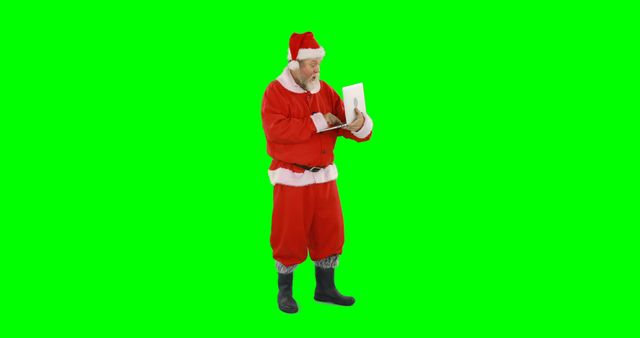 Santa Claus Using Laptop on Green Chroma Key Background - Download Free Stock Images Pikwizard.com