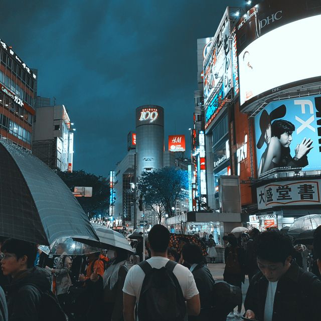 Bustling Shibuya Crossing at Night with Crowds and Illuminated Billboards - Download Free Stock Photos Pikwizard.com